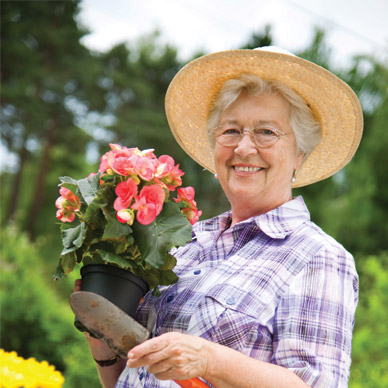 Retired woman gardening