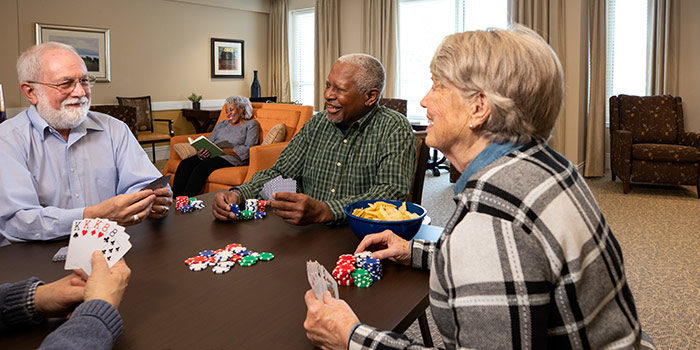 Residents playing poker at Linden House Assisted Living at Branchlands, assisted living in Charlottesville