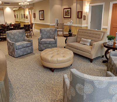 Memory Care neighborhood lounge at The Gardens Memory Care, Linden House Assisted Living and Memory Care