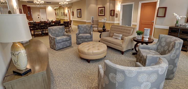 Memory Care neighborhood lounge at The Gardens Memory Care, Linden House Assisted Living and Memory Care
