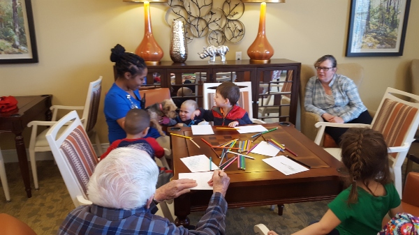 Assisted living activity at Linden House, preschoolers visit residents