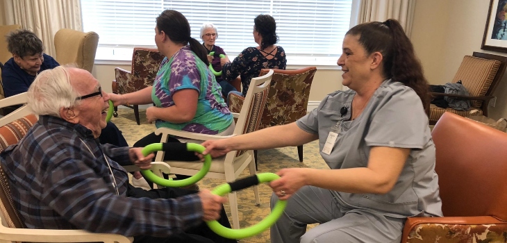 Linden House Assisted Living at Branchlands resident and staff member practicing Smovey exercise