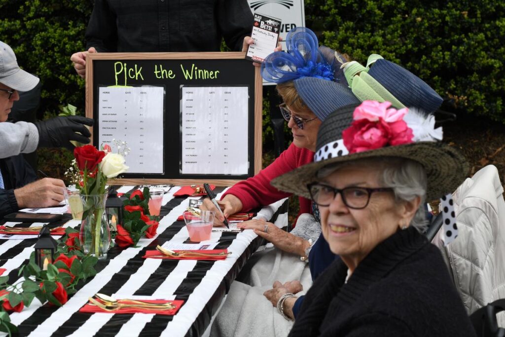 Women at a table for the Run for the Roses Picnic